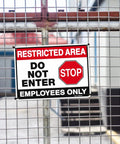 Top Shelf Restricted Area Do Not Enter Signs For Crews Heavy Gauge Aluminum Metal Plate Four Pack on a gate.