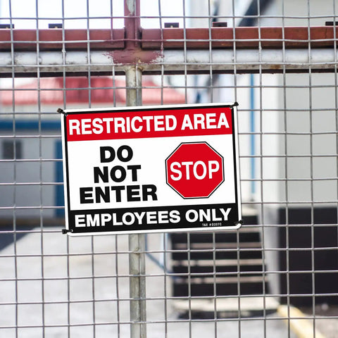 Top Shelf Restricted Area Do Not Enter Signs For Crews Heavy Gauge Aluminum Metal Plate Four Pack on a gate.