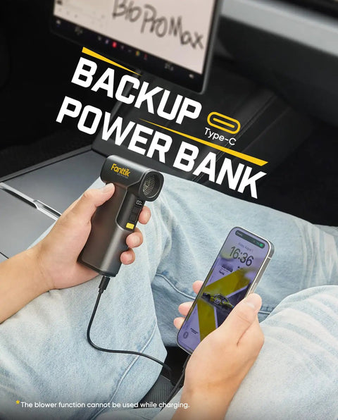 Person using B10 Pro Max Cordless Electric Air Duster With 130000 RPM Brushless Motor as backup power bank, charging phone via USB-C