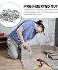 Person assembling wood panels using Two In One 50 Pack 28mm Alloy Furniture Connectors Kit With Cam Lock Fittings And Pre Inserted Nuts