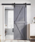 Grey Wood Barn Door Slab 30 Inch By 84 Inch With Included 60 Inch Barn Door Hardware Track Kit Double Surfaces Simple Assembly Required K Frame Rustic Modern Style For Home Or Office installed in hallway