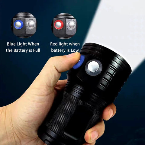 Hand holding Beast Mode Bright 18000 Lumen Diving Flashlight Waterproof To 100 Meters LED Submersible Torch with blue indicator light