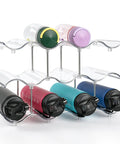 Three Tier Stackable Water Bottle Organizer With Large Compartments filled with colored bottles, clear PET construction