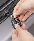 Person securing suitcase with 4 Pack TSA Approved Luggage Lock With 3 Digit Combination, Alloy Body Travel Padlock, Red Indicator