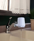 Faucet Mount Water Filter With Advanced Filtration installed on sink, white finish, delivering clean water, easy install at home.
