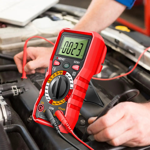Digital Multimeter With Protective Case For Home And Auto Electrical Testing in use on a car engine