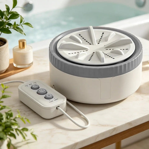 Portable USB Mini Washing Machine With Dead Simple Deep Clean Stain Removal Compact Travel Clothes Washer on a countertop.