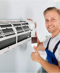 Person using 4 Pack Coil Brush Set For Air Conditioner Condenser And Refrigerator Cleaning HVAC Coil Cleaner on air conditioner fins
