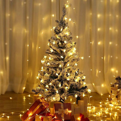 Warm White LED Star String Lights 10 Ft Battery Operated For Indoor Outdoor Decor on Christmas tree with gifts