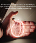 Hand holding a glowing 200mm COB Silicone LED Strip Light With PCB Interface Board Build Kit For P1P P1S X1 X1C A1 And A1 Mini Makeworld DIY Custom Lamp Projects