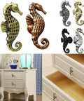 Seahorse design cabinet pulls in various finishes including Dope Seahorse Style Zinc Alloy Cabinet Pull Handle in Matte Black on drawer