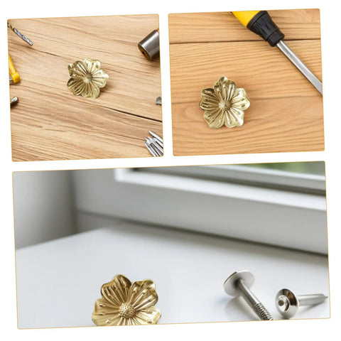 Vintage Brass Flower Cabinet Handle Single Hole Drawer Pull For Wardrobe And Cupboard Doors displayed with screws on wood.