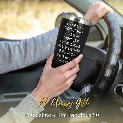 Funny 50th Birthday Tumbler 20 Oz Stainless Steel Insulated Cup For Men And Women Rocking The Big Fifty in hand while driving.