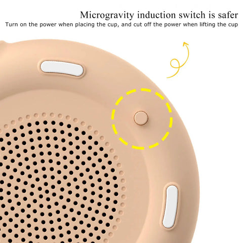 Keep Your Sip Fire All Day Long With This Game Changing Electric Mug Warmer Featuring Smart Gravity Switch close-up of induction switch.