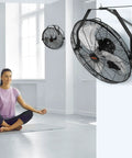 Two Pack 18 Inch Waterproof Wall Mount Fan IP44 Rated Heavy Duty with 3 Speeds High Velocity Up To 4000 CFM in a yoga room
