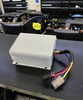 Top Tier 500 Watt Ev Dc Dc Converter Steps High 144V Battery Power Down To Steady 24V Output At 22A With Rugged Isolated Housing on workbench.