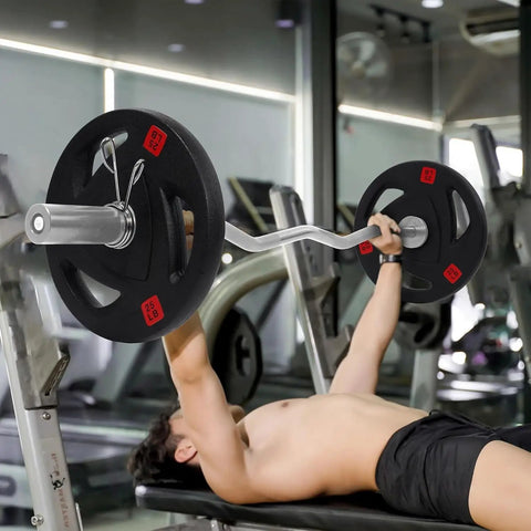 Man using Olympic Curl Bar 47 Inch Barbell With 2 Inch Diameter Chrome Plated Heavy Duty Bar for weight lifting at home gym