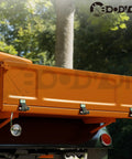 Weld On Trailer Hinges With Grease Fitting, Short Leaf Design Beefy Heavy Duty Dump Trailer Hinges, Raw Surface Finish Truck Trailer Door Hinge, 2 Pack For Easy Install mounted on orange dump trailer door