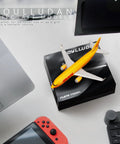 1/400 Scale DHL757 Airplane Model For Collectors And Displays on desktop with box, ideal for collectors, alloy die-cast