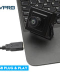 Crisp 16MP USB Camera With 120 Degree Wide Angle Lens No Distortion for PC and Laptop attached to keyboard, IMX298 Sensor visible.
