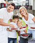 A family grilling sausages using the Two Pack 12 Inch Cooking Tweezers Tongs With Precision Serrated Tips Stainless Steel Chef Tweezers.