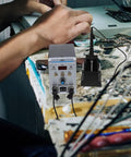 High Power Display Soldering Station Kit With Fast Heating Hot Air Rework Pro Grade Dual Function Soldering Iron in use on workbench.