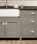 Solid Brass Cabinet Pulls 5 Pack Gold Half Moon Drawer Handles in brushed brass finish installed on kitchen cabinets and drawers