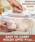 Holding Beast Mode Massive 2700ml Glass Storage Container With Lids For Roasting And Leftovers in hand, filled with chicken.
