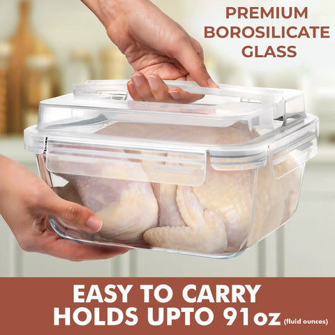 Holding Beast Mode Massive 2700ml Glass Storage Container With Lids For Roasting And Leftovers in hand, filled with chicken.