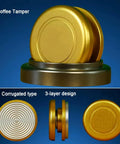 Coffee tamper featuring a gold design, corrugated type and 3-layer construction for use with espresso makers.