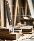 Badass Woodworking Marking Knife Built Tough With A Razor Sharp Double Bevel Blade And Slick Leather Sheath For Precise Layout Marks Whittling And Fine Wood Carving Done Right, showcasing ergonomic handle and carbon steel blade.