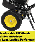Close-up of walk behind broadcast spreader with 13 inch all terrain solid tires showcasing ultra-durable PU wheels.
