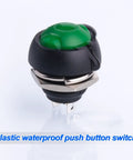 Close-up of green 12Mm Waterproof Momentary Push Button Switch from 15 pack with screw clamp terminals visible.