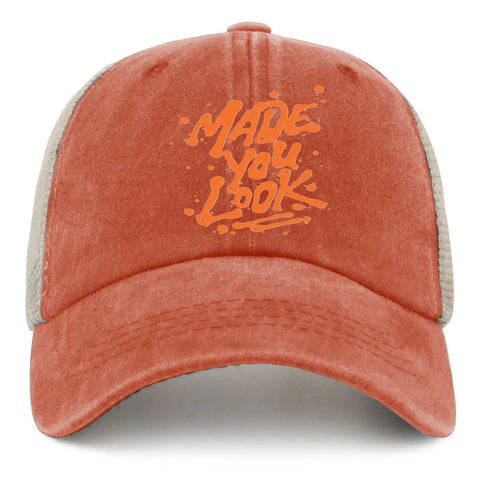 Front view of saffron Look Cool Trucker Hat For Men And Women Funny Humor Cap with breathable ventilated mesh and top air hole.