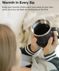 Rechargeable Self Heating Coffee Mug With Adjustable Temperature Control And Charging Base 16 Oz cup held by a person, enjoying warm coffee.