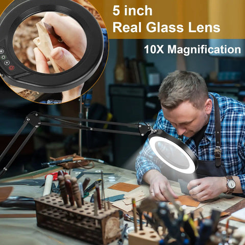 Real Glass 5 Inch Magnifying Glass With LED Light And Stand, showing hands using 10X magnifier for close work on desk