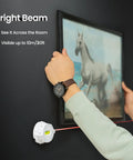 Person using Multi Surface Laser Level With Wall Mount And Pins Or Sticky Pads to align picture on wall with precision.