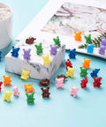 Super Cool Rainbow Counting Bears Set With Nine Rad Colors Perfect For Toddler Math Manipulatives And Preschool Activities Totally Kid Approved Educational Classroom Toys, colorful plastic counting bears on a blue surface.