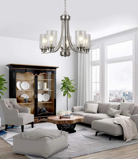 5 Light Brushed Nickel Chandelier With Clear Glass Shades in modern living room setting