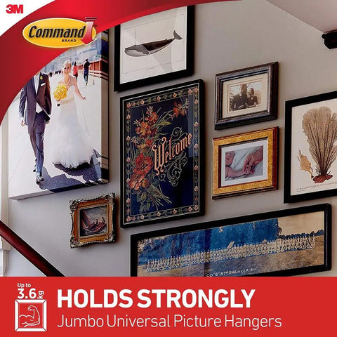 Gallery wall with various framed art and photos using Damage Free Hanging Picture Hangers With No Drill No Tools Frame Hanger.