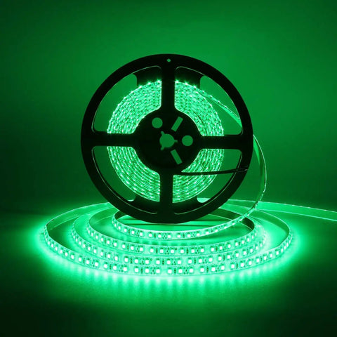 600 LEDs Green Rope Light Strip Waterproof 16.4 Ft Flexible Tape For Bedroom Boat Car TV Backlighting And Party Decor Self Adhesive EZ Install Ultra Bright 2835 SMD LEDs on a spool glowing in the dark.