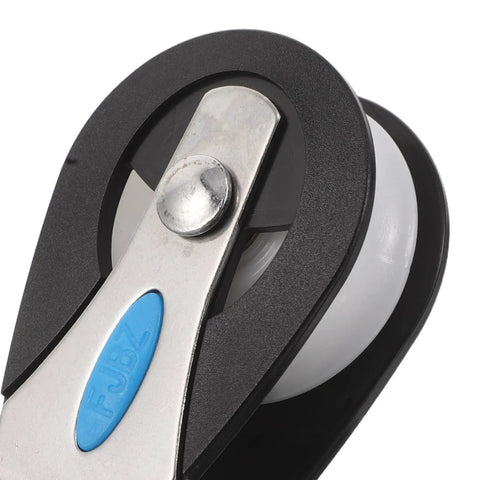 Close-up of Stainless Steel Nylon Marine Pulley Swivel Block Bearing Wheel for yacht, kayak, canoe gear and outdoor use.