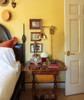Bedroom with Plug In Gold Swing Arm Wall Sconces Set Of Two Modern Brass Finish Wall Lamps and eclectic decor.