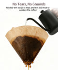 Pouring hot water over Cone Coffee Filters Size 02 Unbleached, 200 Count, 2-4 Cup, showing coffee drip process.