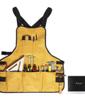 Durable Canvas Work Apron With 21 Tool Pockets, Handy Magnetic Holder displayed with tools, torso length apron for DIY enthusiasts