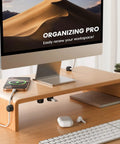 Go To Rotatable Cord Organizer 360 Degree Cable Clips Adhesive Wire Holder installed on wooden desk with electronic devices.