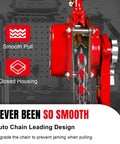 Close-up of red 3-ton manual lever chain hoist with steel chain and rotating hooks