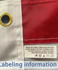Label instructions on Heavy Duty 3x5 Outdoor American Flag Built To Last In High Wind With UV Protection, brass grommet visible