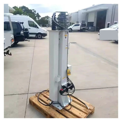 Electric Hydraulic Telescopic Mast Aluminum Push Up Antenna Pole with sturdy base on a pallet, ready for setup.