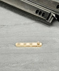 Close-up of 8 Pack Copper Hidden Rotating Door Hinges With Top And Bottom Rotation Mechanism on gray surface